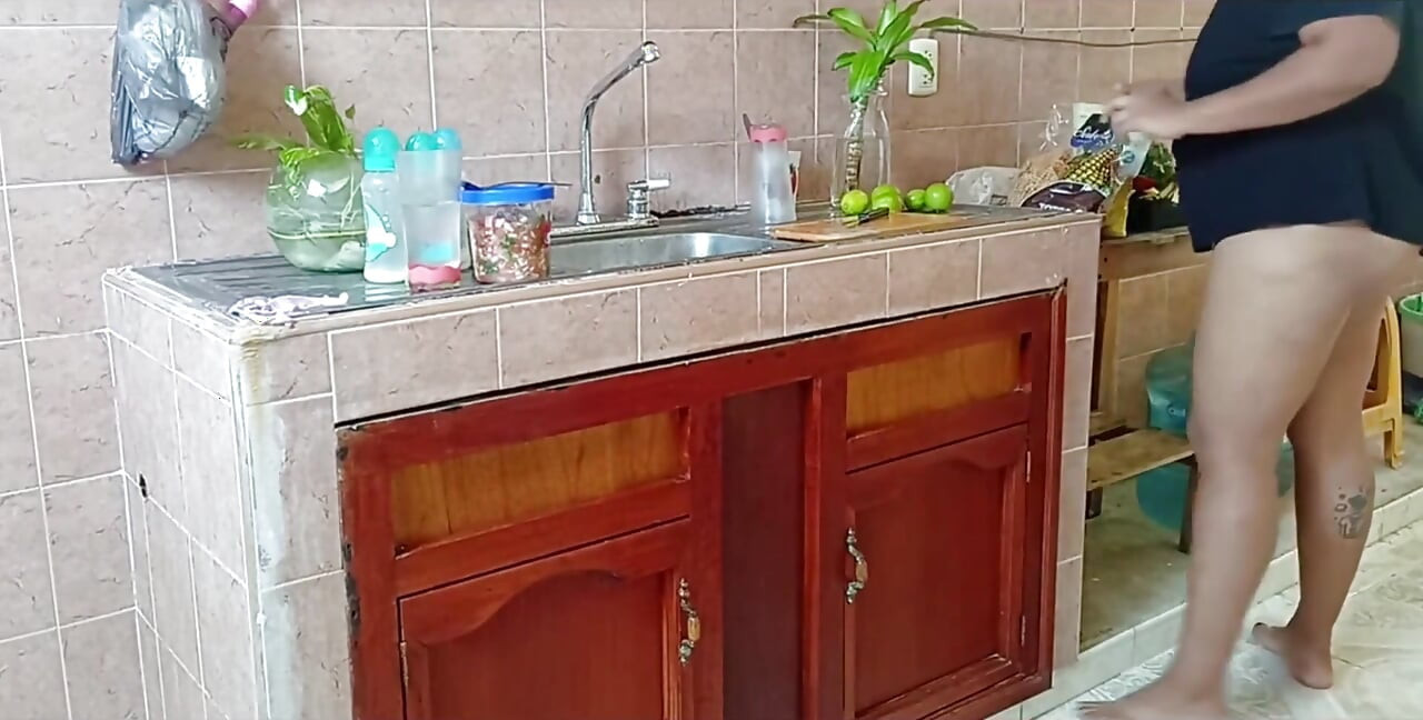 Chubby Stepmother Washes and Cleans the Kitchen
