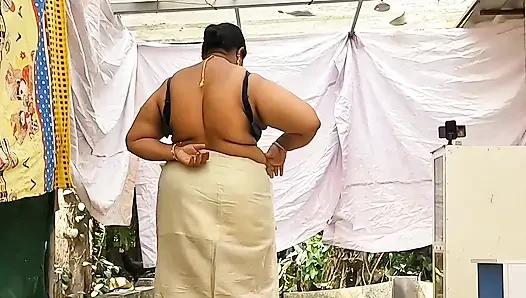 Traditional kerala style dressed Bhabi showing her huge sexy boobs, walking topless