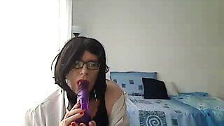 MILF tranny simulates a Blowjob by playing with a vibrator