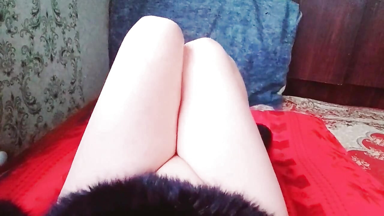 Playful trans girl holding ice cream with wink