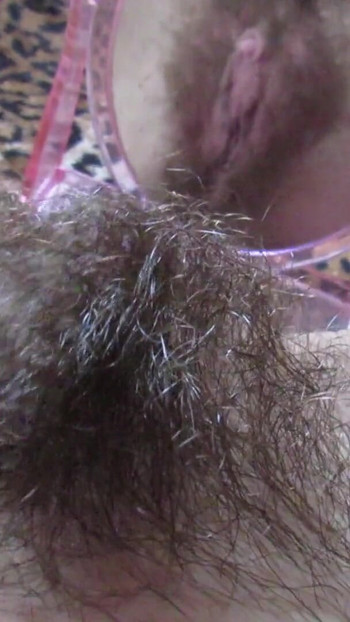 Must-see moment from "Closeup hairy pussy play with mirror and big clit"