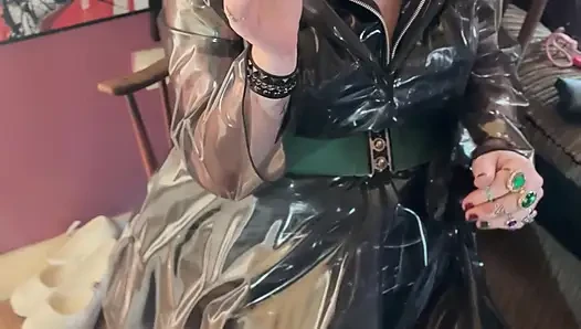 PVC Clad In Her See Through Coat Miss Tina Snua Smokes A Cigarette For You
