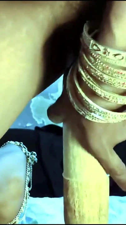 Emotional moment from "TROROSE Indian Bhabhi Enjoys Belan In Her Cat In Desi Style"
