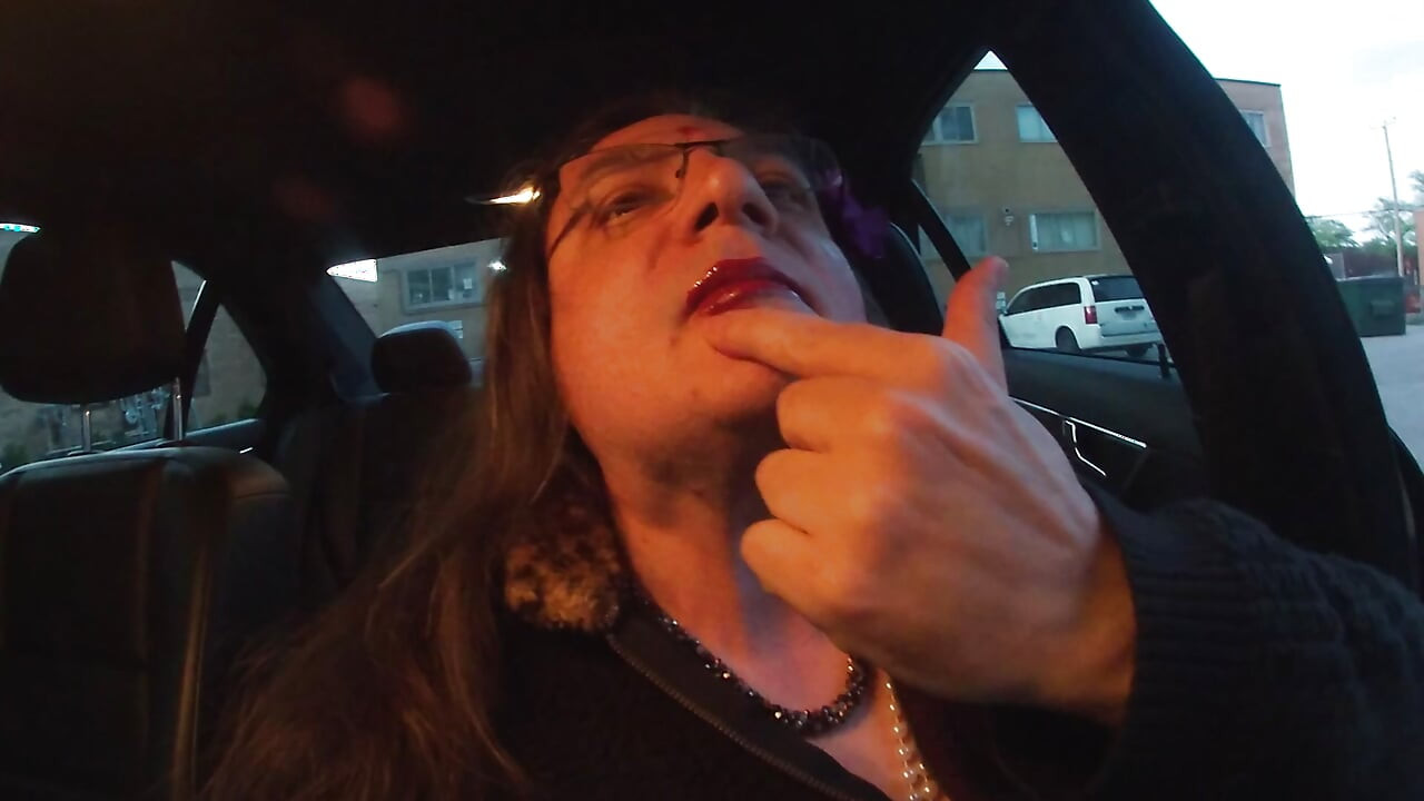 Mature Sissy TV walking the Parking Lot at dusk