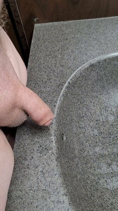 Tiny cock peeing