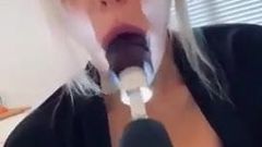 Bimbo blonde fucks her holes with a big power tool dildo