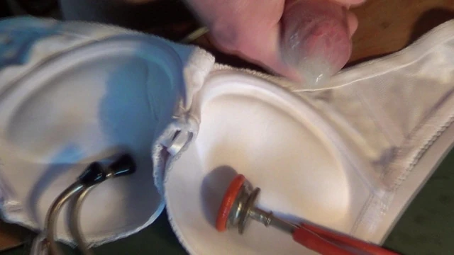 Condom wank with bra...