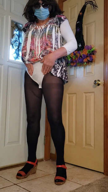 Memorable moment from "Crossdresser in my sexy new mini dress."