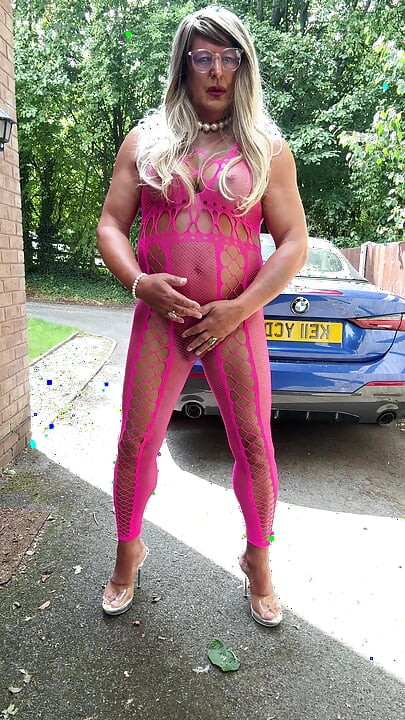Sexy Crossdresser Kellycd2022's in pink fishnet catsuit and heels