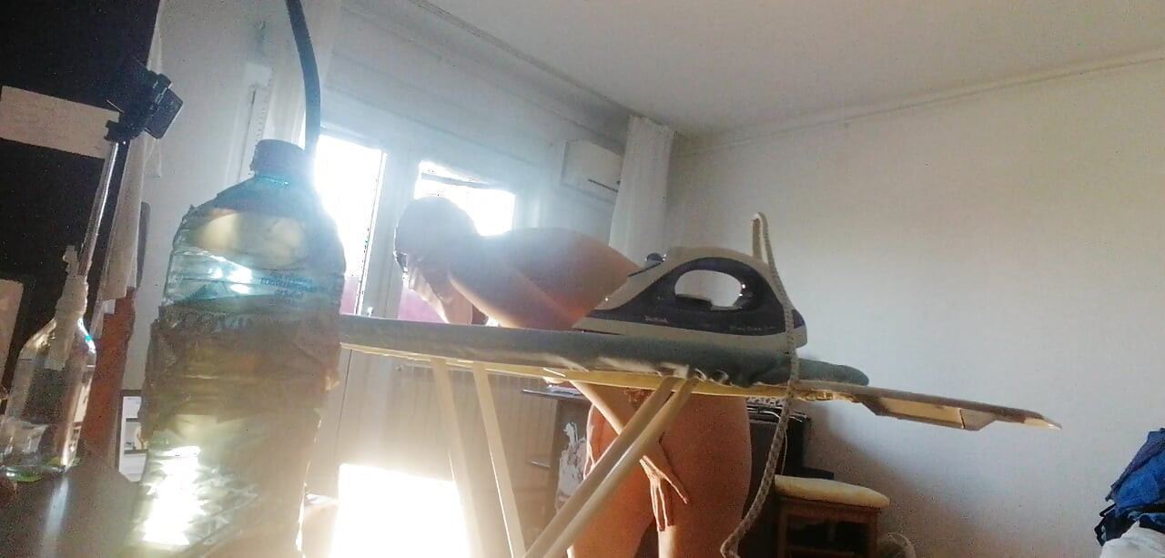 Sexy wife does housework naked. Hot hairy Latin hair, big tits, big ass.