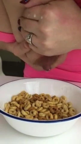 CUTE MILF MILKING HUGE TITS INTO CEREAL
