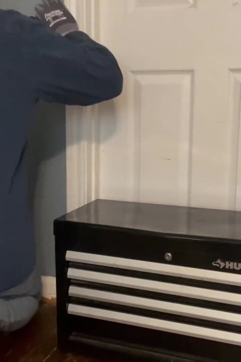 Repairman Gets Distracted by Toy in His Toolbox