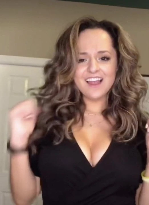 The Busty Educator rocking her cleavage