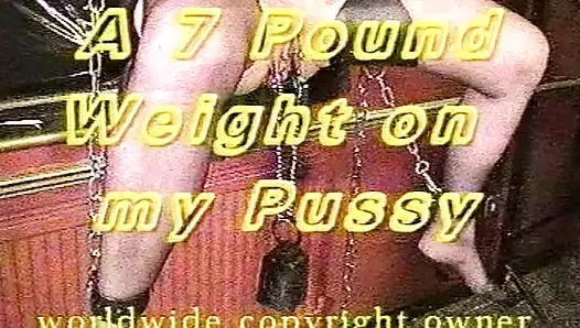 A 7 pound weight on my pussy while being tied up in the air
