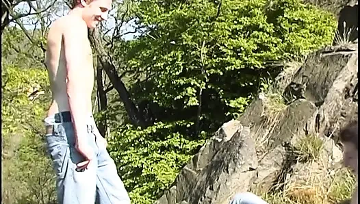 Athletic homosexual couple fucking outdoors