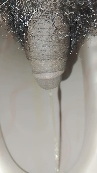 Boy pissing closeup video