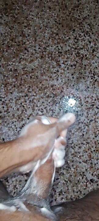 A Young Hindu Boy From India Is Fucking His Thick Cock Hard with His Hands While Taking a Bath