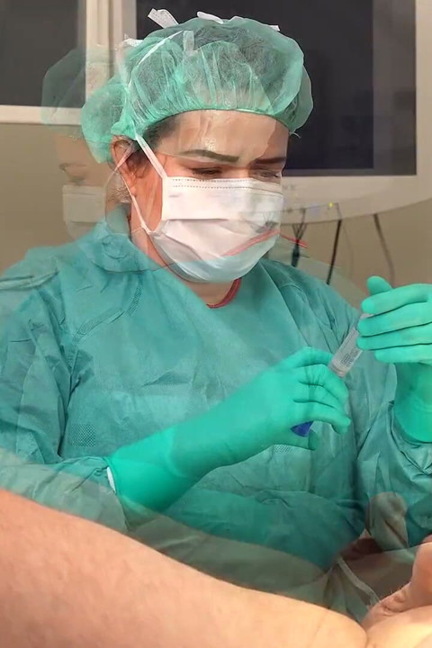 Sounding with Sterile Surgical Latex Gloves and Gown.
