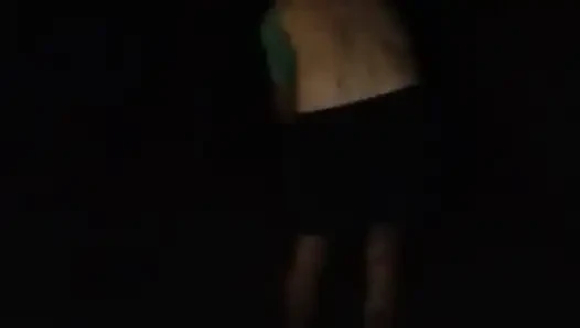 Naked walking on the hill along highway