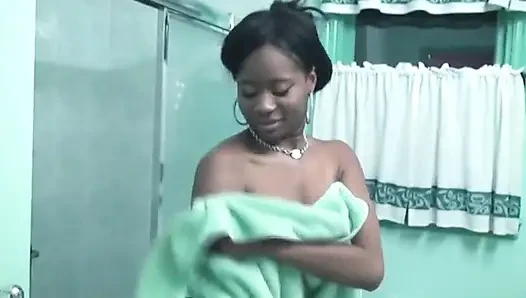 Leggy black chick with big breasts gets wet and soapy in shower at hotel