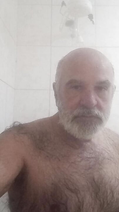 HAIRY BRUTE TAKING A SHOWER