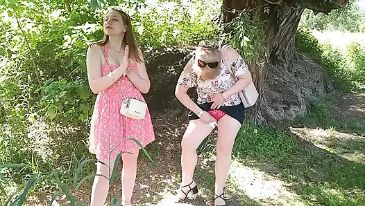 Two women girl and mature milf took off red panties peeing on side of road in public Pee Outdoor Outside  Lesbians kiss