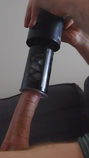 Key moment from "BestVibe STORM CUP 10 Thrusting Spinning Masturbation Cup with Suction Cup. Big cock cumshot"