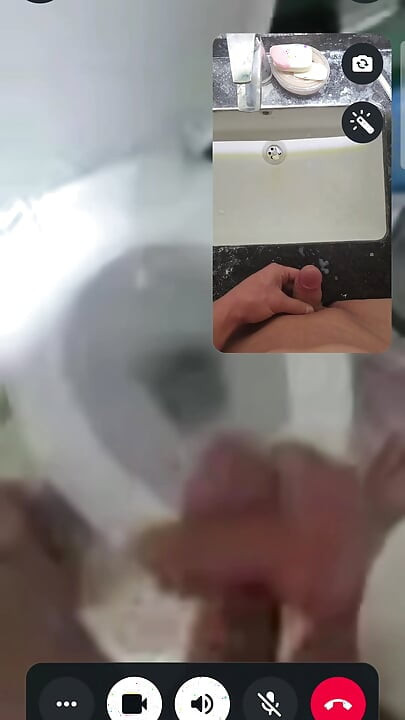 Lovers masturbating each other