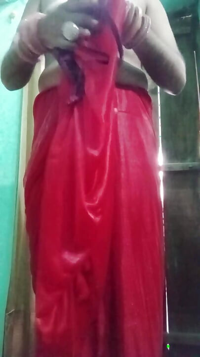 Indian Gay Crossdresser Bottom Gaurisissy Pressing Her Big Boobs and Feeling Horny in Red Saree with Heavy Jwellery