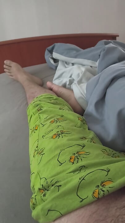 Cute handjob on the bed with a hard and erect penis
