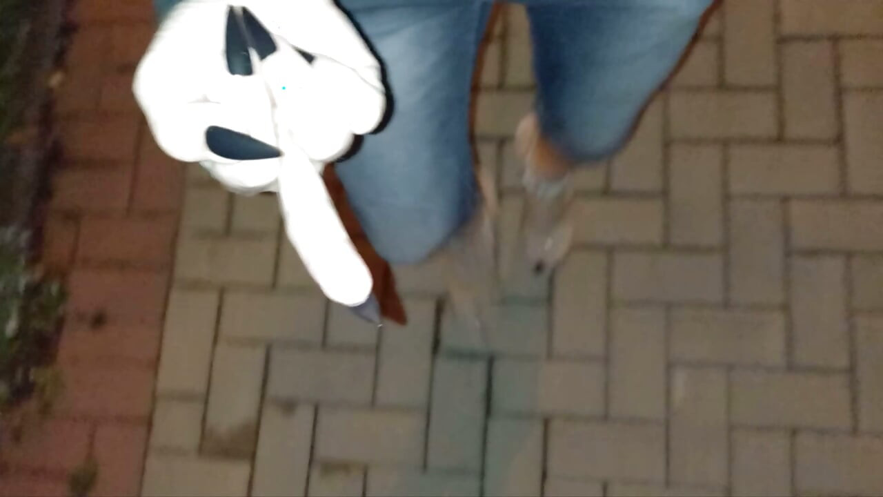 nighttime crossdressing on a public street in 20cm stripper heels, black toes, and black claws