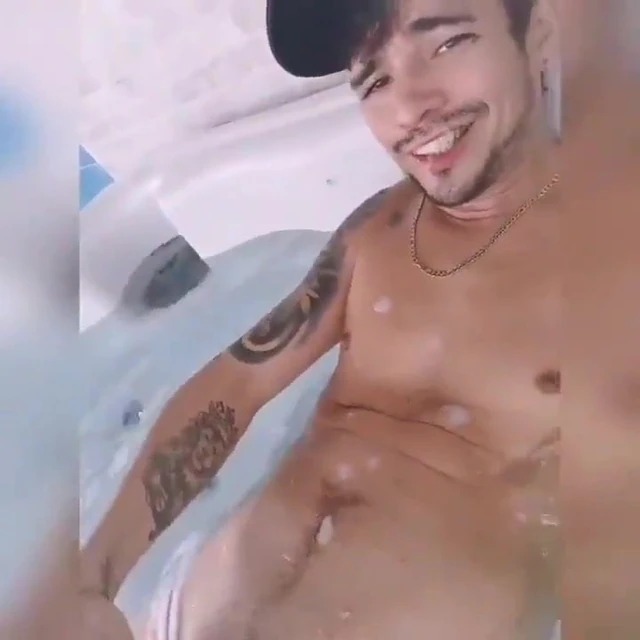 wanking and cumming in the hot tub