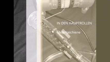 Melkmaschine im Einsatz  Mann