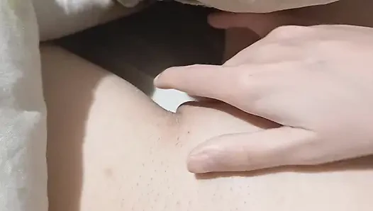 I masturbate riskily under the covers next to my stepsister at night