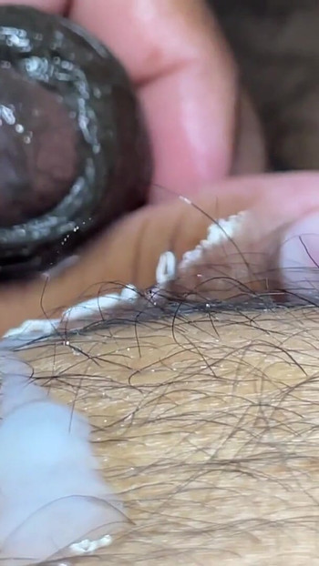Thrilling moment from "Guy masturbating by rubbing the head of the dick and fingering it like a pussy"