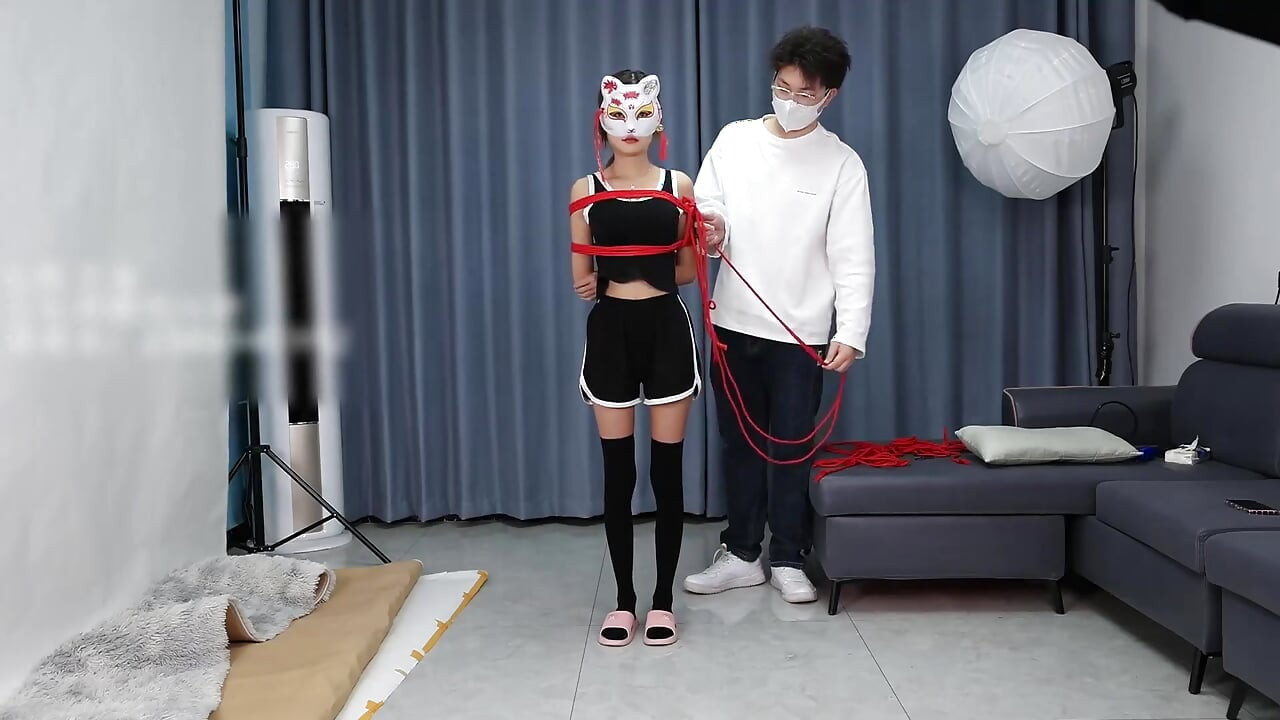 A Young, Beautiful, Slender, and Adorable Girlfriend, with Black Stockings, Red Strings, and Restraints