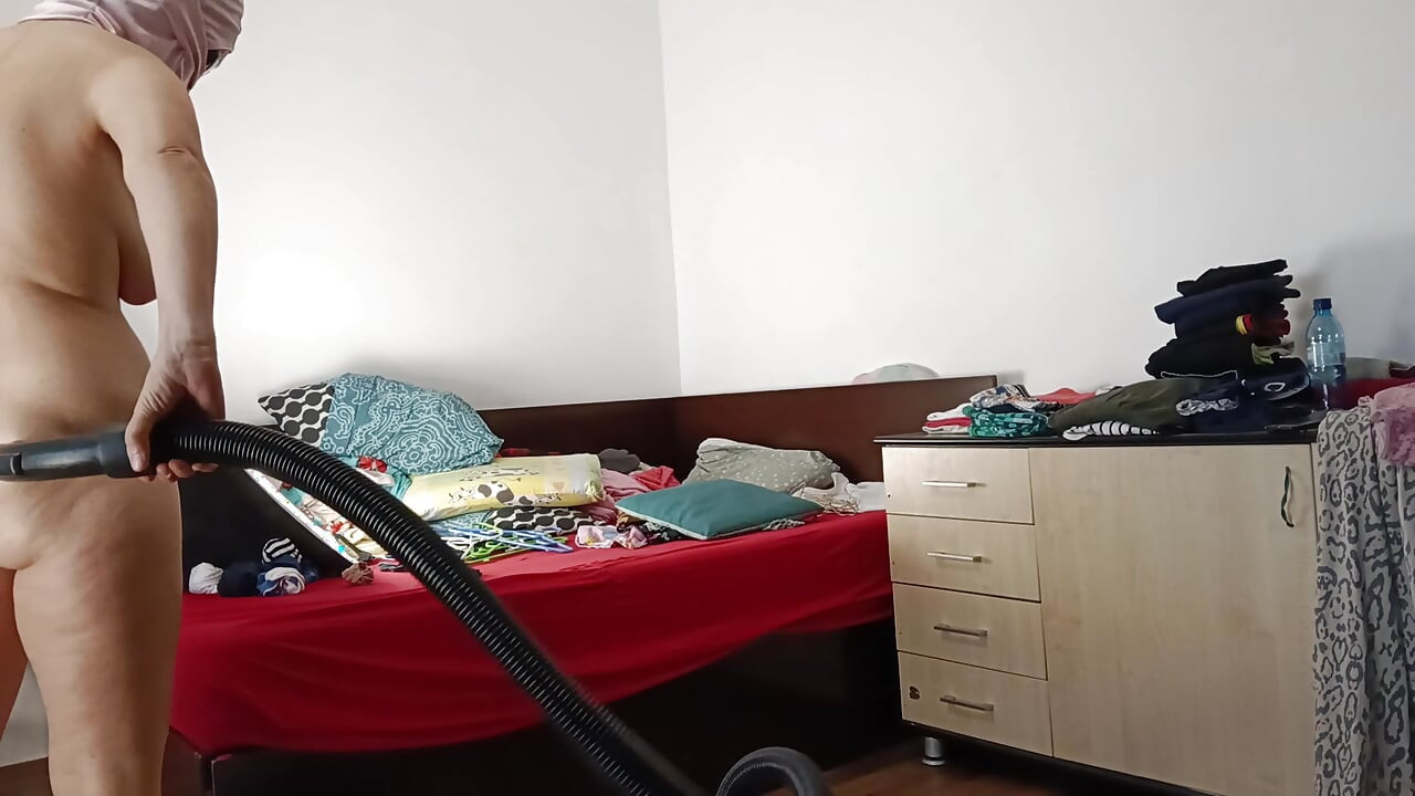 Amateur wife vacuuming in the bedroom. Amateur wife gives me a handjob until I cum.