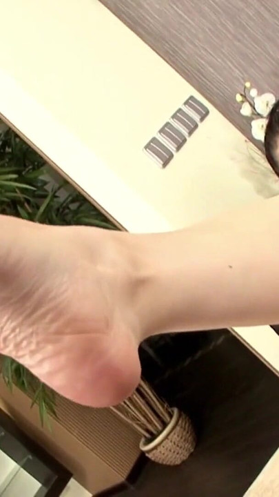 Key moment from "Fuss fetisch man cums on skinny brunettes feet"
