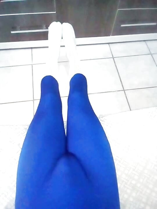 Fun at home wearing a blue Zentai costume with socks