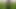 Hot guy jerks off under a pinwheel in nature
