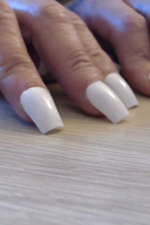 Tapping clicking white fingernails