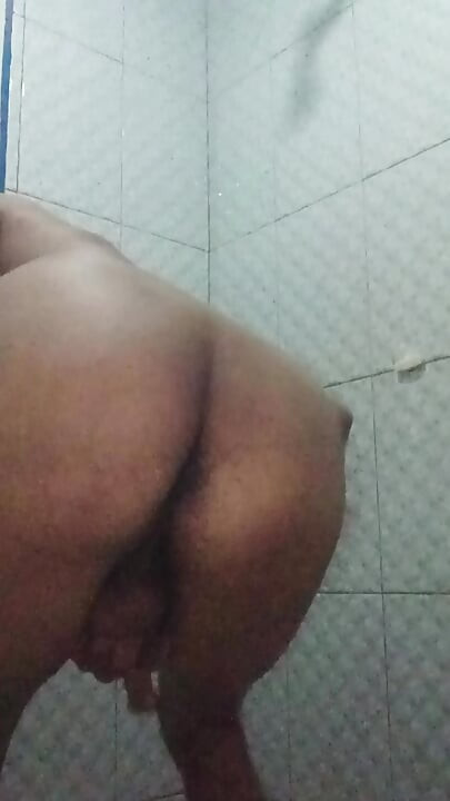 standing jerking off in a public toilet