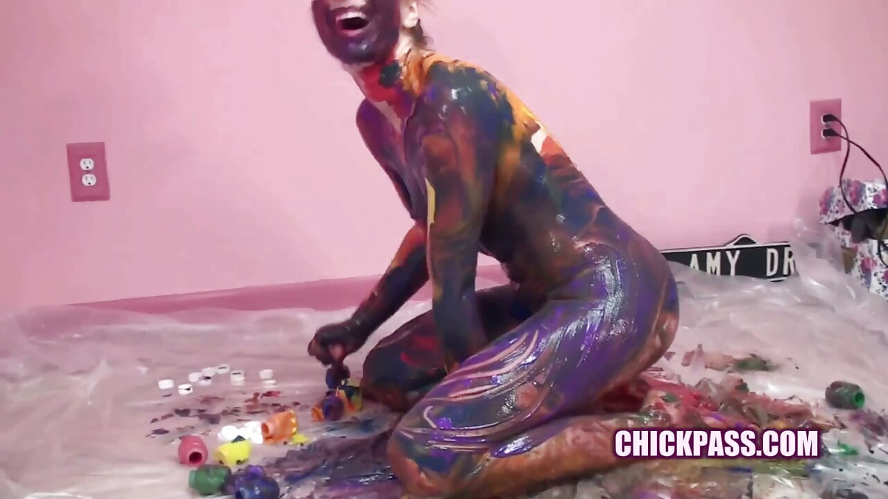 Kinky coed Lina is covered in paint