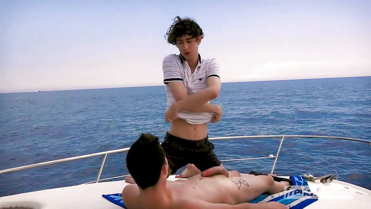 The captain and his skipper fuck a young client on the boat