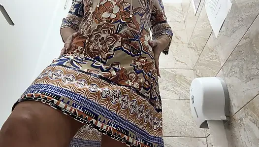 Sexy milf has intense orgasm in public toilet