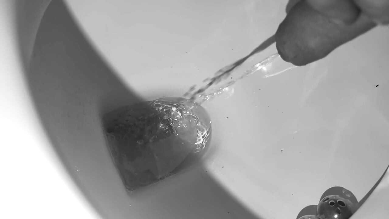 Super slow motion piss