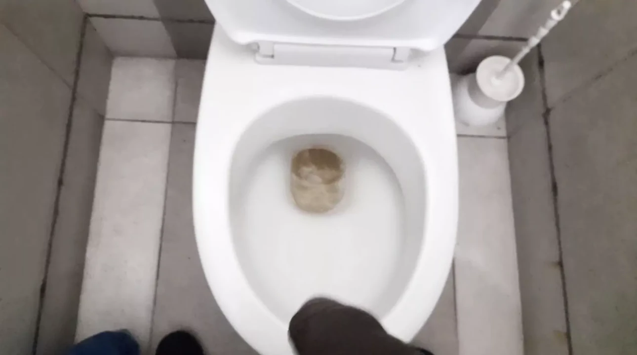 In the hotel bathroom, pissing hot and jerking off