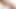 Naughty transsexual Oil solo plays on a bed with her prick