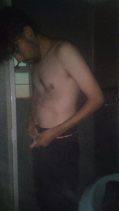 Man Showering with Flashlight On