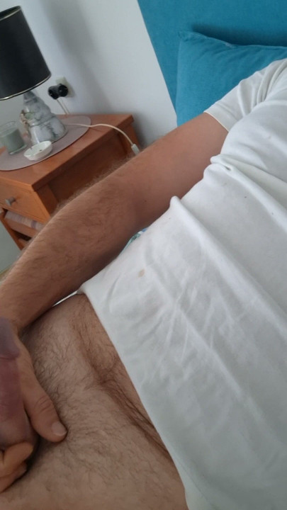 Masturbating